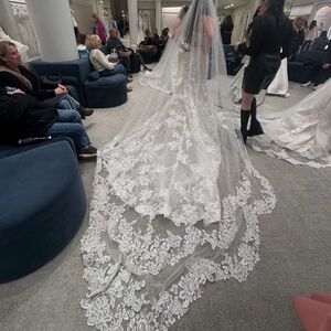 Cathedral length Kleinfeld scalloped lace wedding veil